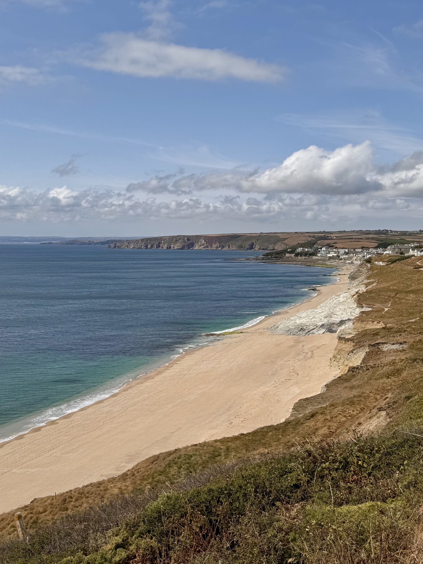 View back along the beach towards Porthleven from the cliffs on the coast path